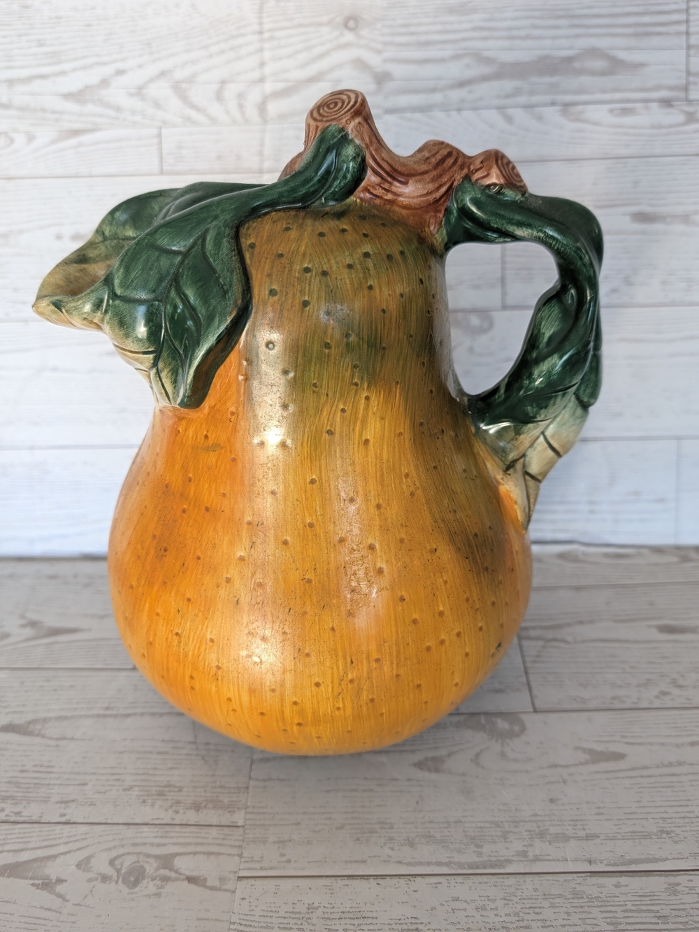 Sakura Orange Pear Ceramic Pitcher with Green Leaf Handle